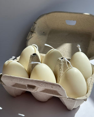 Vela con forma de huevo realista